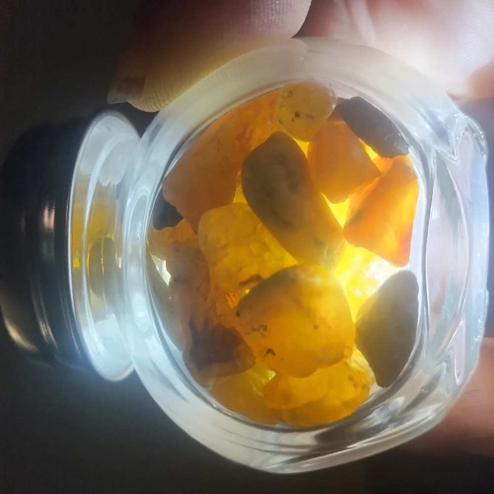Amber Stones in Glass Jar